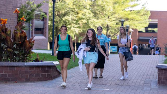 Students walking across campus